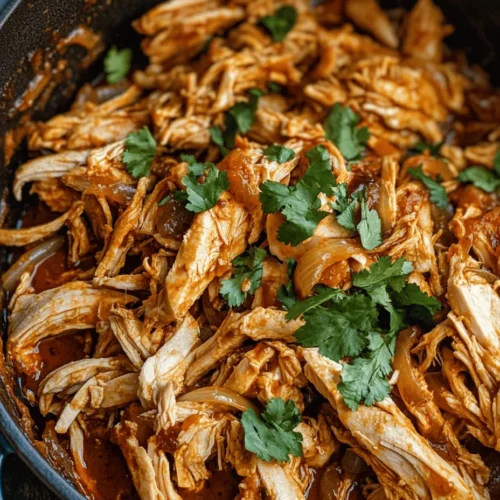 At the heart of this recipe is the Dutch oven, a culinary tool treasured by home cooks for its exceptional ability to retain moisture and enhance flavors. This heavy-duty pot, typically made of cast iron and often coated with enamel, provides even heat distribution, allowing for slow and steady cooking. When it comes to pulled chicken, the Dutch oven creates an environment where the chicken can gently simmer in its own juices, absorbing the aromatic flavors of the accompanying ingredients. The result is tender, juicy chicken that easily shreds apart with a fork, making it perfect for any dish you choose to create.