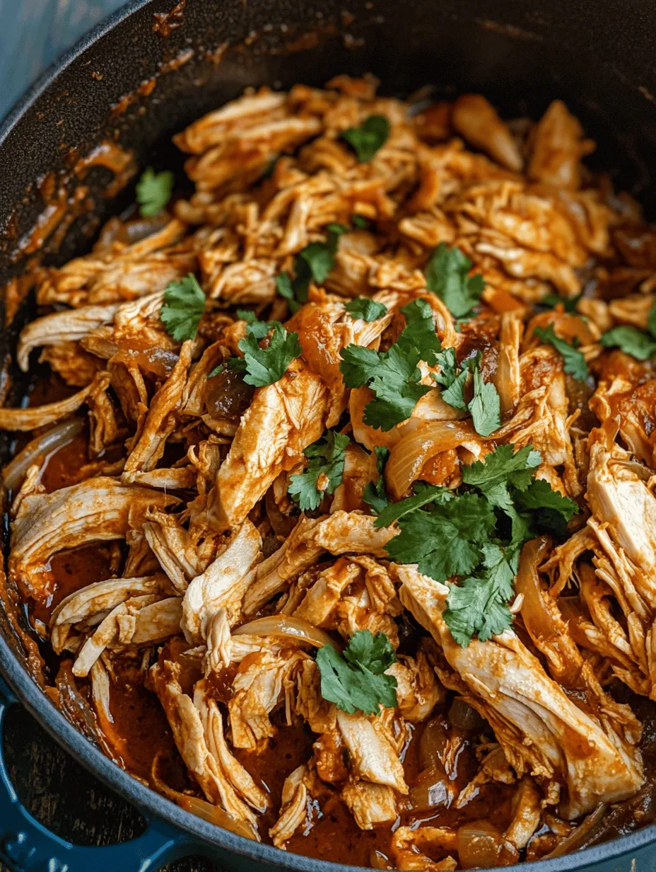 At the heart of this recipe is the Dutch oven, a culinary tool treasured by home cooks for its exceptional ability to retain moisture and enhance flavors. This heavy-duty pot, typically made of cast iron and often coated with enamel, provides even heat distribution, allowing for slow and steady cooking. When it comes to pulled chicken, the Dutch oven creates an environment where the chicken can gently simmer in its own juices, absorbing the aromatic flavors of the accompanying ingredients. The result is tender, juicy chicken that easily shreds apart with a fork, making it perfect for any dish you choose to create.