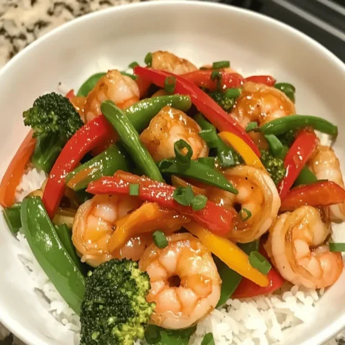 In a world where time is often limited and healthy eating can feel like a challenge, the Quick & Zesty Shrimp and Veggie Stir-Fry emerges as a delightful solution. This vibrant dish not only tantalizes your taste buds with its colorful array of vegetables and succulent shrimp but also showcases the beauty of quick preparation without compromising on flavor or nutrition. Perfect for busy weeknights, this recipe allows you to whip up a wholesome meal in just 30 minutes, making it an ideal choice for families, students, or anyone looking to enjoy a healthy dinner on a time crunch.