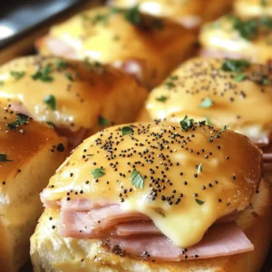 In the world of comfort food, few dishes can compete with the delightful combination of sweet and savory flavors found in ham and cheese sliders. These bite-sized treats are a perfect blend of indulgence and convenience, making them an ideal option for gatherings, family dinners, or even a cozy night in. Their small size allows for easy serving and eating, making them a favorite among both kids and adults. Whether you’re hosting a game day party, planning a holiday meal, or just looking for a delicious snack, Sweet & Savory Ham & Cheese Sliders are sure to impress your guests and satisfy your cravings.