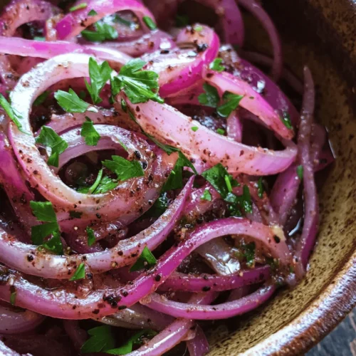 Zesty Sumac Onions are a vibrant and flavorful dish that encapsulates the essence of Middle Eastern cuisine. This simple yet delightful recipe showcases the beauty of fresh ingredients, transforming everyday red onions into a tangy and aromatic condiment. Traditionally served as a garnish or a side dish, Zesty Sumac Onions elevate a variety of meals, adding a burst of flavor that can enhance anything from grilled meats to salads.