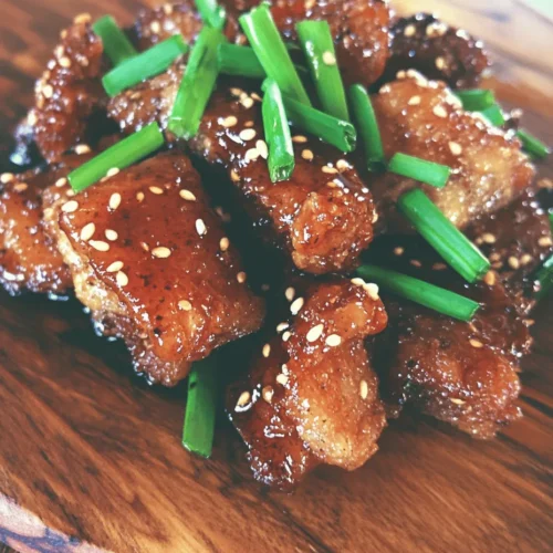 Crispy Chinese Honey Garlic Chicken is a beloved dish that embodies the perfect balance of textures and flavors, making it a staple in many Chinese restaurants around the world. Known for its crunchy exterior and succulent interior, this dish offers a delightful experience with every bite. The combination of crispy chicken coated in a sweet and savory honey garlic sauce creates an irresistible allure that appeals to both children and adults alike.