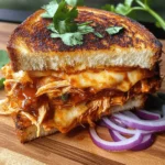 In the world of comfort food, few dishes can rival the classic grilled cheese sandwich. This beloved staple has stood the test of time, cherished for its simplicity and warm, gooey goodness. However, when you add a twist with BBQ chicken, you elevate this traditional favorite into a mouthwatering delight that satisfies both savory cravings and nostalgic comfort. The BBQ Chicken Grilled Cheese Delight combines the smoky sweetness of BBQ sauce with tender, shredded chicken and a melty cheese blend—all encapsulated between two slices of perfectly toasted sourdough bread.