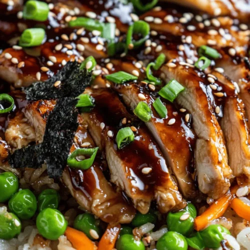 Fried rice is a beloved dish in many cultures, but the Japanese take on this classic showcases a unique blend of flavors and techniques that elevate it to something truly special. The "Savory Japanese BBQ Chicken Fried Rice Extravaganza" is a delightful fusion of tender marinated chicken, vibrant vegetables, and perfectly cooked rice, all brought together by the rich and savory notes of soy and teriyaki sauces. This dish not only satisfies your hunger but also provides a comforting taste of Japan, making it a perfect addition to your culinary repertoire.
