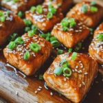 If you’re searching for a dish that tantalizes your taste buds while also providing a healthy dose of nutrition, look no further than Fiery Sweet Hot Honey Salmon Bites. This delectable recipe combines the rich, buttery flavor of salmon with a unique blend of sweet and spicy elements, making it an irresistible option for both appetizers and main courses. The contrast of flavors not only excites the palate but also showcases the culinary trend of marrying sweet and spicy profiles in seafood dishes, allowing home cooks to explore bold flavors in their kitchens.