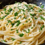 Garlic Parmesan Pasta is a dish that embodies comfort and flavor, making it a favorite for pasta lovers around the world. This pasta dish is not just quick and easy to prepare; it's also packed with rich flavors, thanks to the harmonious blend of garlic, Parmesan cheese, and creamy sauce. Whether you're looking to whip up a satisfying weeknight dinner for your family or preparing a special meal for guests, Garlic Parmesan Pasta fits the bill perfectly. Its simplicity allows it to shine in a multitude of settings, from casual weeknights to elegant gatherings.